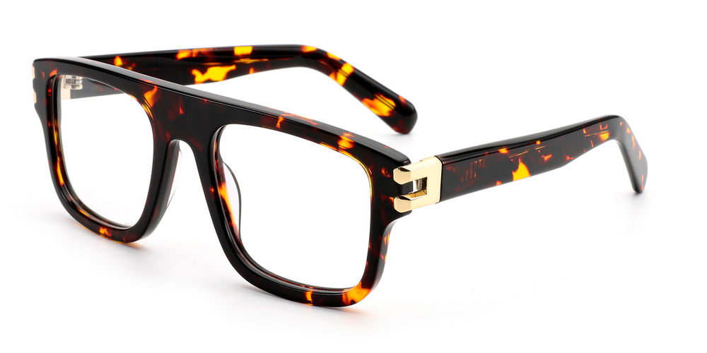Tortoiseshell eyeglasses with gold accents on a white background