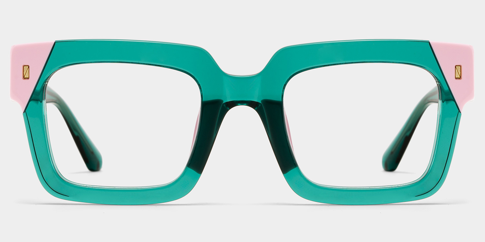 Teal eyeglasses with pink temples on a light gray background