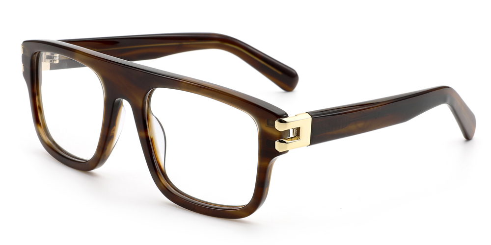 Brown eyeglasses with gold accents on a white background