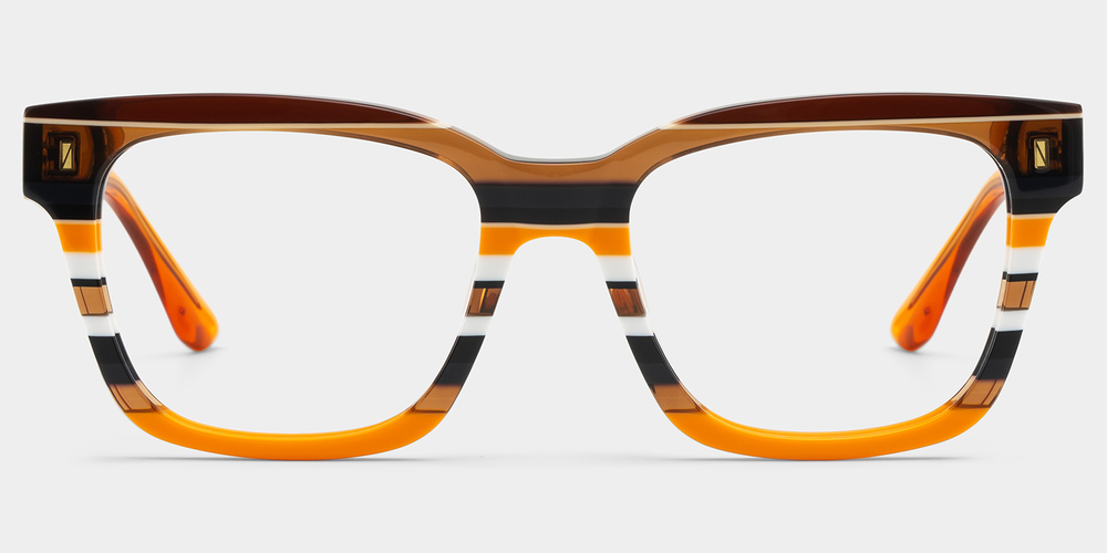 Multicolored eyeglasses on a light gray background